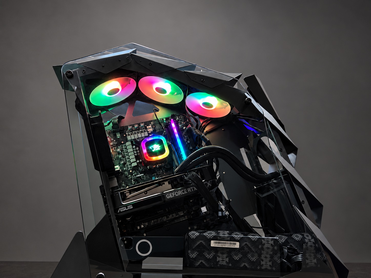 Open-air Predator-style RGB gaming PC on a neutral background